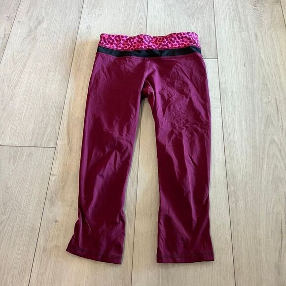lululemon athletica Pants - lululemon athletica Wine Red Cropped Leggings with Pink Leopard Waistband